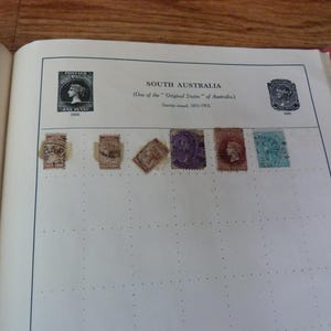 Vintage Stamp Album over 675 World Stamps 1900s-1950s Africa Europe Indian States Japan 350 pages Stanley Gibbons Strand Album