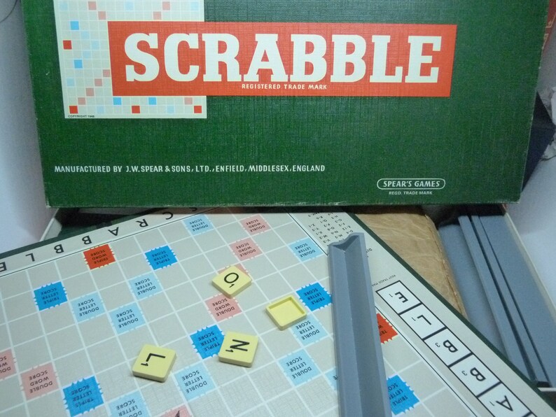 Vintage Scrabble board game by Spear's Games dated 1955. Complete original set: Board, racks and 100 letter tiles. Made in England word game With Grey racks