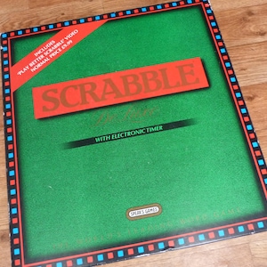 Vintage Deluxe Scrabble set with Electronic Timer and Turntable Board complete game plus VHS video by Spear&#39;s Games dated 1988