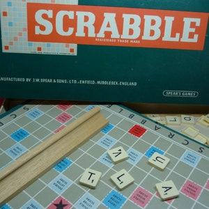 Vintage Scrabble board game by Spear's Games dated 1955. Complete original set: Board, racks and 100 letter tiles. Made in England word game With Wooden racks