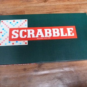 Scrabble Classic Complete Game with Wooden Letters Green Box Design dated 2002, Sealed Version Available