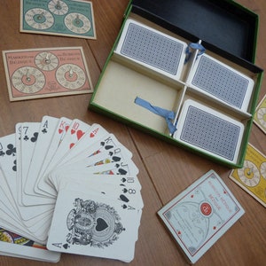 De La Rue Bezique game Complete with 4 decks playing cards 4 markers and rules booklet Bezique and Rubicon Bezique