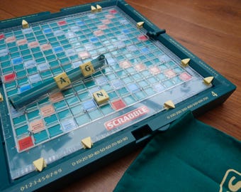 Vintage Travel Scrabble set, push-in tiles in hard plastic folding case complete game by Spear's Games. Handy travel word board game