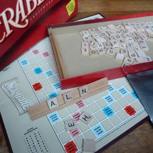 Vintage American Scrabble Edition Complete Set Original Game with Wooden Letters by Parker games date 2001. Word board game