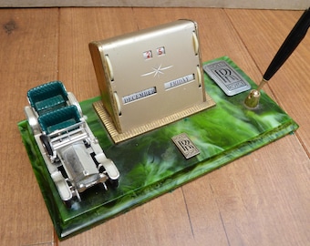 Vintage Rolls Royce Perpetual Desk Calendar Golden Starburst with Model Silver Ghost and Pen Stand 1950s Vintage