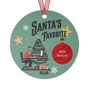 May include: A round Christmas ornament with a red ribbon. The ornament features a teal background with the text "SANTA'S FAVORITE" and a graphic of a person working at a desk near a Christmas tree. The ornament also has the text "Data Analyst" and the name "DYLAN".