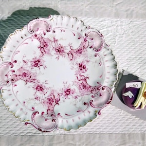 Antique Limoges flat-footed sweet stand, French Compotier, ca 1900, delicate raspberry pink with gold, rocaille pattern. Antique condition.