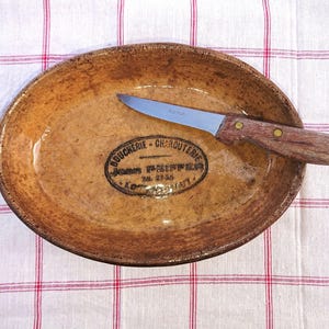 Very Ancient French butcher, paté dish. With emblem of the butcher shop. Circa 1930. Very rare. Oval clay earthen dish.Custom made. Antique.