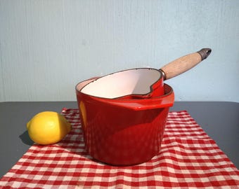 LeCreuset & NOMAR France. The cousins. Cast iron pots enamelled in the same red, 1970s, forever, well preserved. Vintage. Rare.age. rare