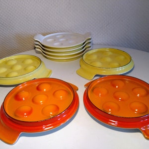 Pair of snail pans, cast iron enameled, vintage Belgium. Choice orange or yellow, LeCreuset style. Rare Mid-century. Well preserved. Forever