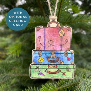 Bags of Love - Une décoration de valise de Noël pour les familles rendant visite à leurs proches ce Noël