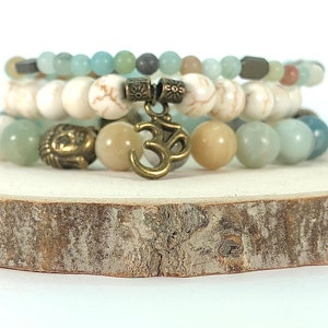 Conjunto de pulseras de amazonita hechas a mano: dijes de turquesa, Ohm y Buda.