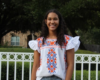 Mexican Shirt white with blue and orange full embroidery and ruffled sleeves. Perfect game day attire! S-2XL