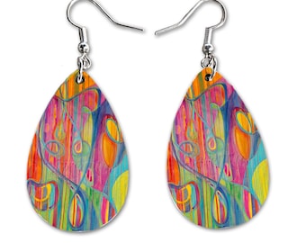 May include: A pair of teardrop-shaped earrings with a colorful abstract design. The earrings are made of metal and have silver hooks.