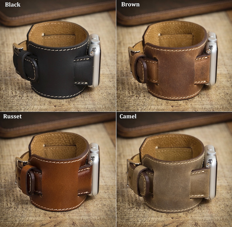 Peut inclure: Une collection de quatre bracelets de montre larges en cuir pour montre connect&eacute;e, pr&eacute;sent&eacute;s en noir, marron, roux et camel. Chaque bracelet pr&eacute;sente un design &agrave; manchette &eacute;paisse, des coutures contrast&eacute;es claires, une boucle et un connecteur argent&eacute;.