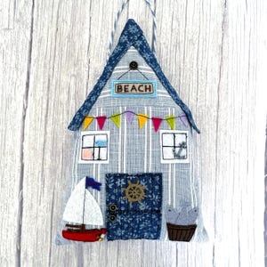 Handmade hanging textile beach hut.