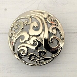 Cut out floral design, domed, lighter weight metal shank buttons 20mm SILVER