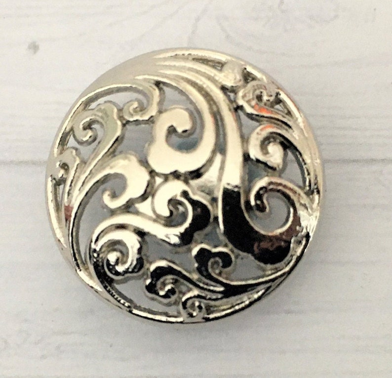 Cut out floral design, domed, lighter weight metal shank buttons 20mm SILVER