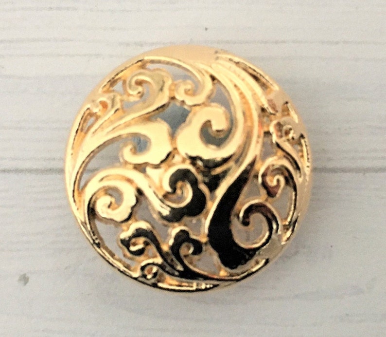 Cut out floral design, domed, lighter weight metal shank buttons 20mm GOLD