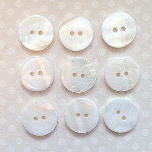 REAL MOTHER of PEARL Buttons x 9. 2 hole buttons, 10mm natural shell buttons. 10mm mother of pearl buttons.