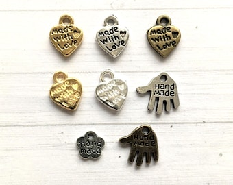 Metal 'handmade' charms/labels.