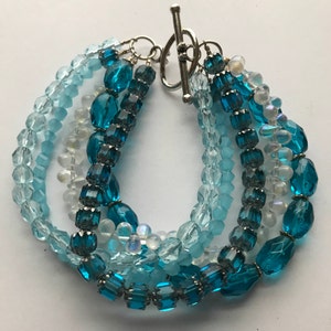 Bracelet - 5 Strand Blue Glass