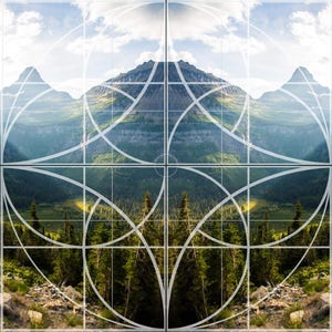 May include: A symmetrical image of a mountain range with a grid overlay. The grid is made up of squares and circles, creating a geometric pattern. The mountain range is in the background, and the foreground is a forest of trees.