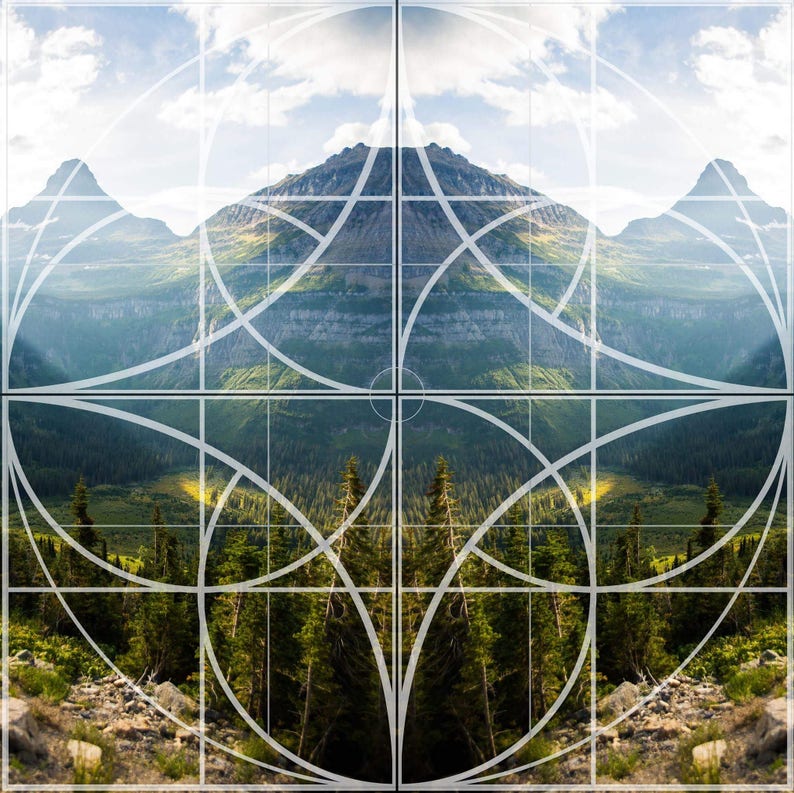 May include: A symmetrical image of a mountain range with a grid overlay. The grid is made up of squares and circles, creating a geometric pattern. The mountain range is in the background, and the foreground is a forest of trees.