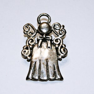 9403 Handcrafted Signed Artisan Stylized Angel Brooch-Pendant in Sterling Silver.