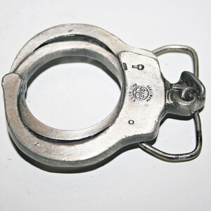 Handcuff belt buckle store