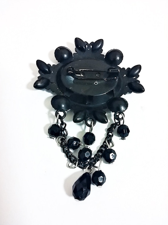 black glass and blackened steel 1980\u2019s Victorian Revival gothic black cameo brooch retro metal punk goth