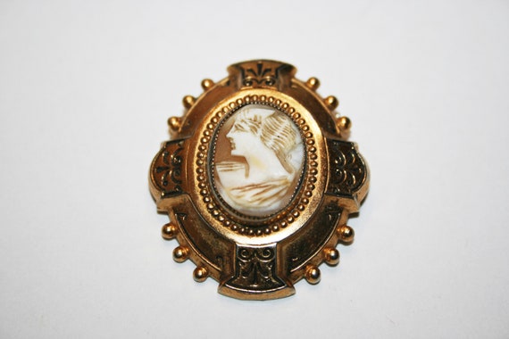 Vintage Hand Carved Gold Tone Cameo Brooch - image 1