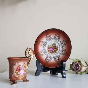 Vintage Waldershof Demitasse Cup & Saucer – Fragonard Scene, Gold Trim, 3 Footed Spiral Handle