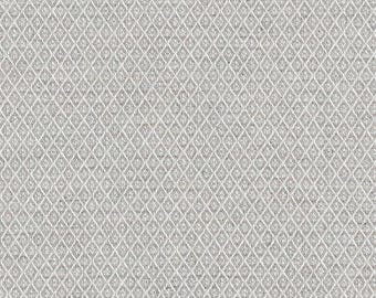May include: A close-up of a white fabric with a repeating diamond pattern.