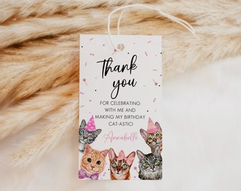 May include: Thank you for celebrating with me and making my birthday cat-astic!  Annabelle. A white card with pink confetti and a pink and white cat party hat.  Four cats wearing party hats are illustrated on the card.
