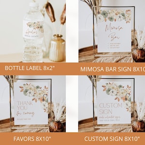 May include: Four printable signs for a bridal shower. The signs feature a floral design with pumpkins and the text "Anding's Bridal Shower", "Mimosa Bar", "Thank You for Coming", and "Custom Sign". The signs are 8x10 inches.