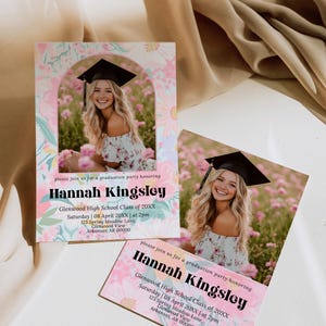 May include: Graduation party invitations featuring a photo of a smiling woman in a graduation cap. The invitations have a floral design with the name "Hannah Kingsley" and event details. The background is a soft, neutral color.