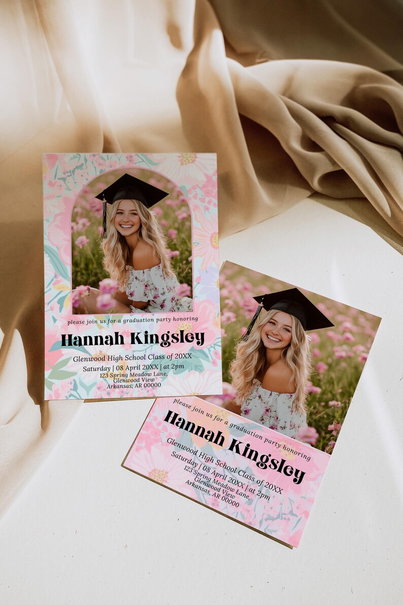 May include: Graduation party invitations featuring a photo of a smiling woman in a graduation cap. The invitations have a floral design with the name "Hannah Kingsley" and event details. The background is a soft, neutral color.