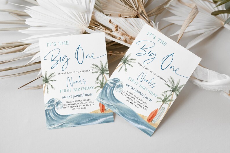 May include: Two blue and white beach-themed invitations with the text "It's the Big One" and "Noah's First Birthday" with palm trees, waves, and surfboards. The invitations are for a party on 08 Sat April at 10am at Mason Beach House, 123 Redwood, California. RSVP by April 5th to Megan at 123 456 7890.
