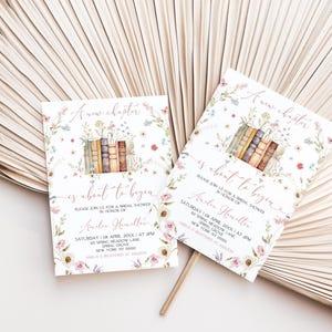 May include: A bridal shower invitation with a floral design and the text "A new chapter is about to begin". The invitation features a stack of books with flowers on top and the text "Please join us for a bridal shower in honor of [Bride's name]" with the date and time of the event.