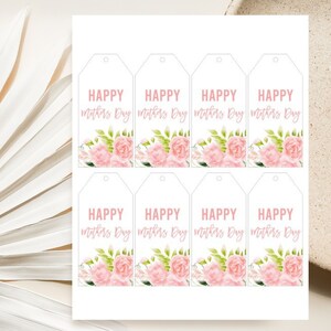 May include: Eight printable gift tags featuring a floral design and the text "HAPPY Mothers Day" in pink lettering.