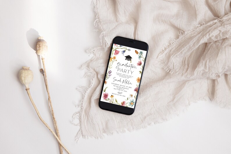 May include: A digital invitation on a smartphone screen with a floral border and the text "Graduation Party" and "Sarah Miller".