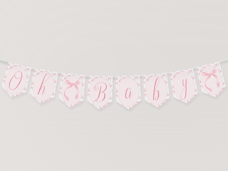 May include: Pink and white banner with the words "Oh Baby" in cursive script.