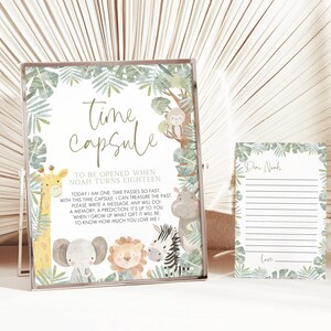 May include: A white card with green leaves and animal illustrations around the border. The card says "Time Capsule" and "To be opened when Noah turns eighteen."  The text continues, "Today I am one. Time passes so fast with this time capsule, I can treasure the past. Please write a message, any will do, a memory, a prediction. It's up to you. When I grow up what gift it will be to know how much you love me."