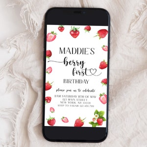 May include: A digital invitation with a white background and red strawberries. The text reads "Maddie's berry first birthday. Please join us to celebrate. 1AM Saturday 11th of May. 123 Main Street. New York, NY 10001. RSVP to Sarah 123 456 789"