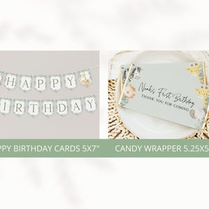 May include: A set of printable party decorations for a baby's first birthday. The set includes a banner that says "Happy Birthday" and a candy wrapper that says "Noah's First Birthday" with a jungle animal theme. The banner is 5x7 inches and the candy wrapper is 5.25x5.5 inches.