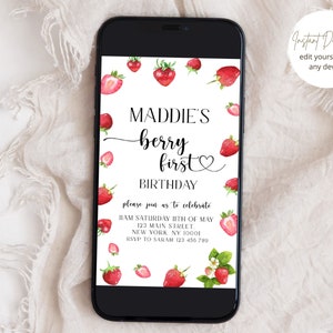May include: A digital invitation with a white background and red strawberries. The text reads "Maddie's Berry First Birthday" with a heart symbol. The invitation includes the date, time, address, and RSVP information.