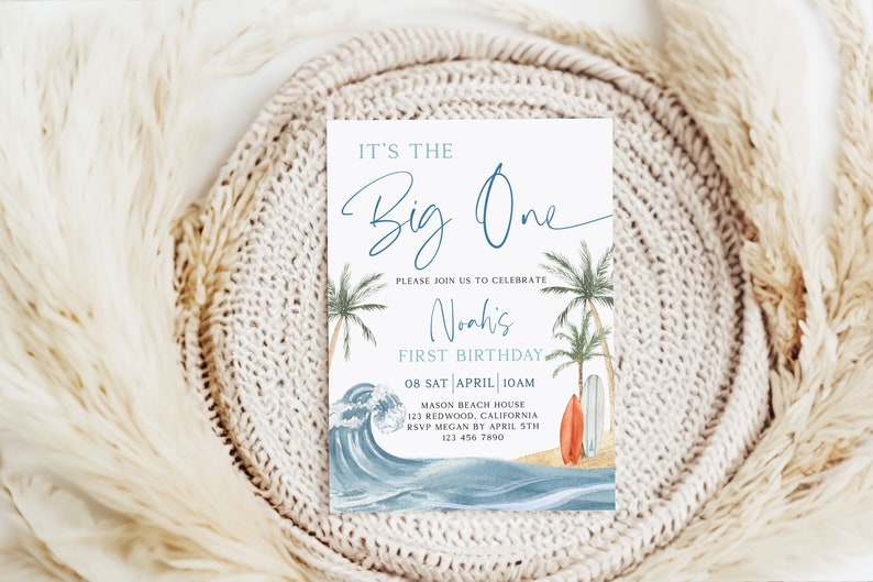 May include: A blue and white invitation card with a beach theme. It says "It's the Big One" and "Noah's First Birthday". The invitation includes a date, time, and location for the party.