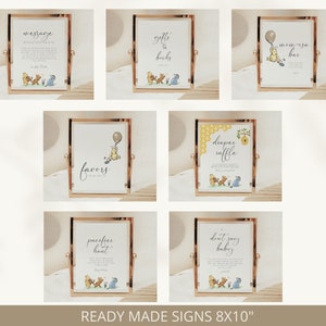 May include: Set of ten printable Winnie the Pooh baby shower signs in gold frames. The signs include: Message, Gifts & Books, Mom-to-be Bar, Diaper Raffle, Favors, Pacifier Hunt, Don't Say Baby. Each sign features Winnie the Pooh and friends.