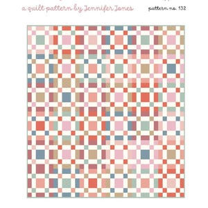 May include: A quilt pattern titled "Andy" by Jennifer Jones. The design features a grid of colorful squares in shades of pink, red, blue, and tan. The pattern is labeled as precut friendly and suitable for toddlers, throws, and beds.